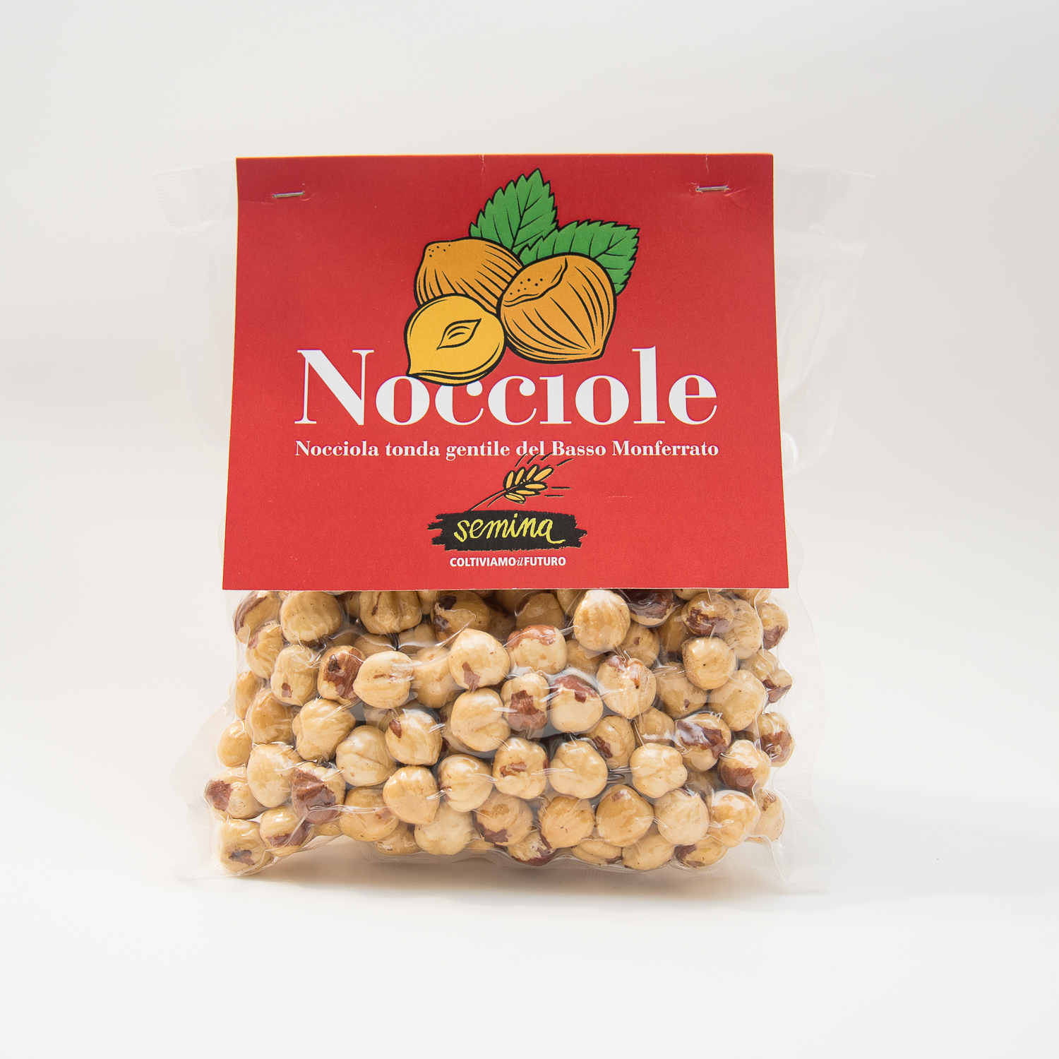 NOCCOLE. Presso Cascina Abele, la prima comunità aperta dal Gruppo Abele nel 1973, si trova un noccioleto che produce frutti della pregiata varietà tonda gentile. Nocciole tostate intere (confezione da 200 gr). 